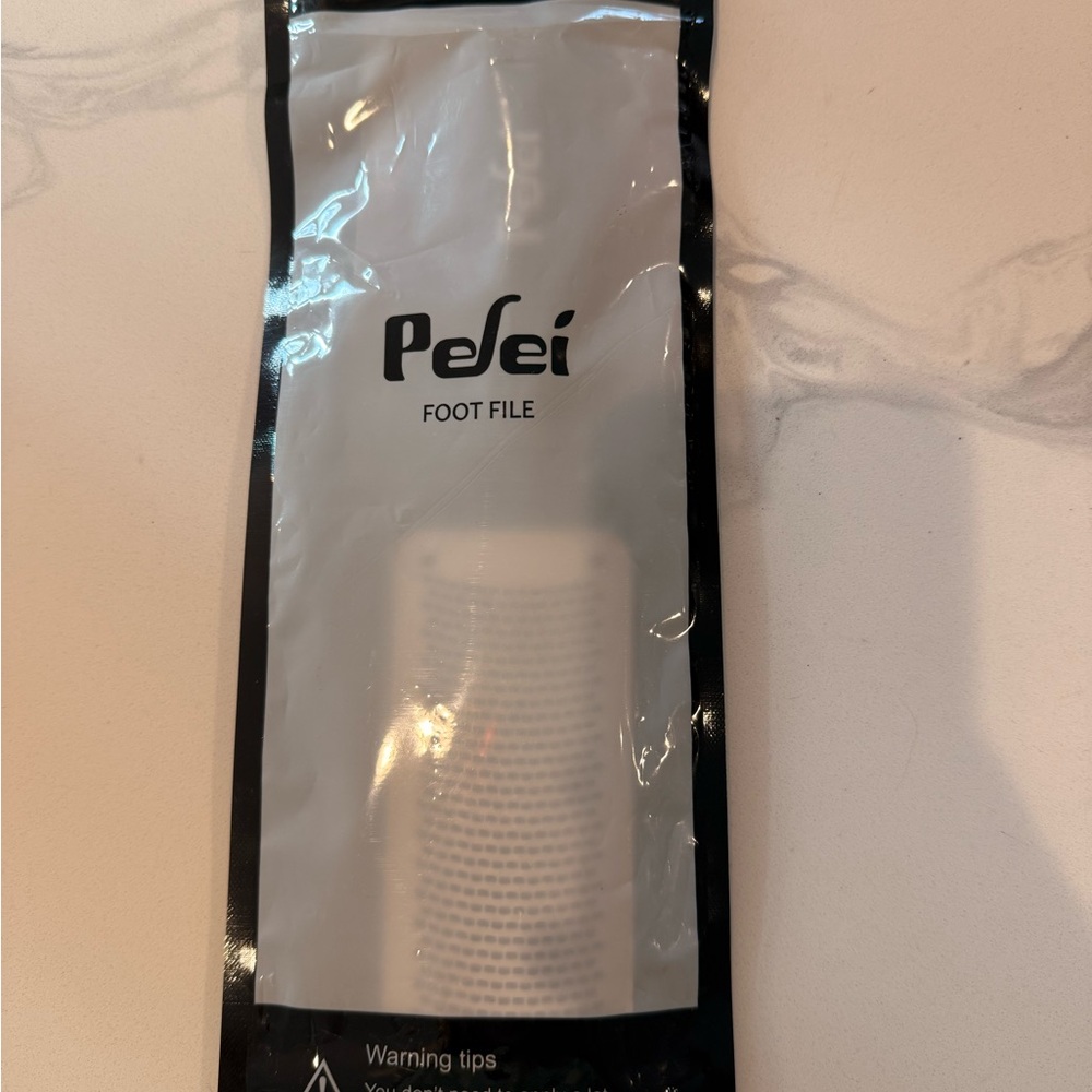 Black and White Foot Care Tool